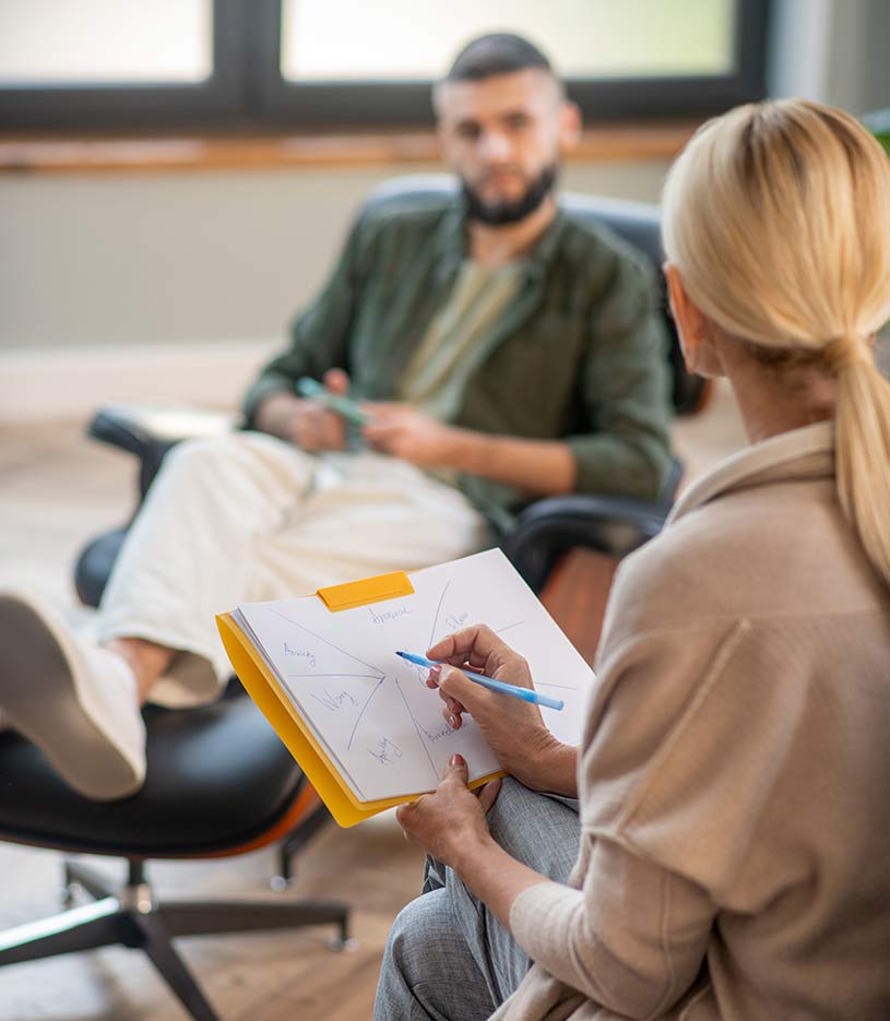 psychoanalyst holding paper and pen while making n 2023 11 27 05 16 43 2H89UFM